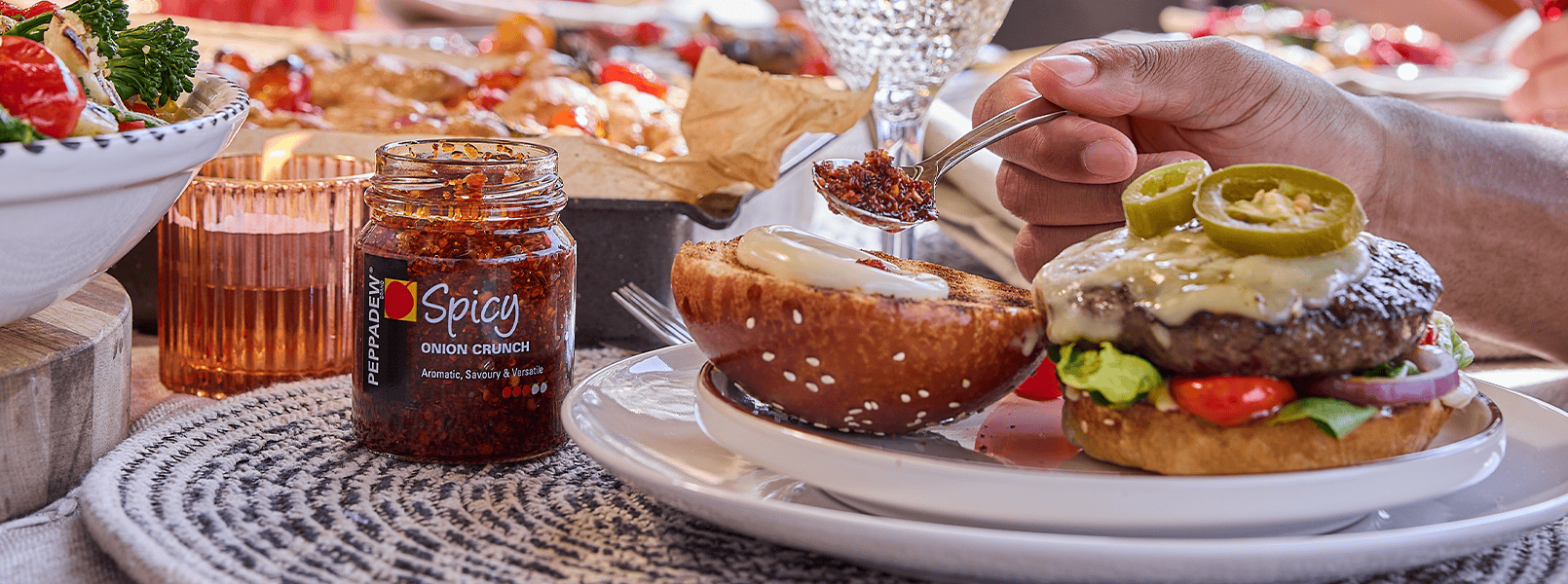 Enjoy the taste of the PEPPADEW® Spicy onion Crunch burger