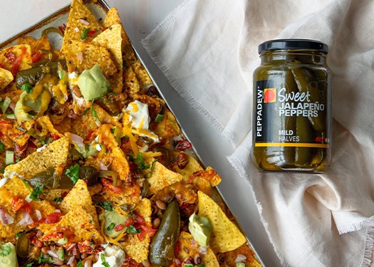 Fully Loaded PEPPADEW® Sweet Jalapeño Pepper Nachos Traybake